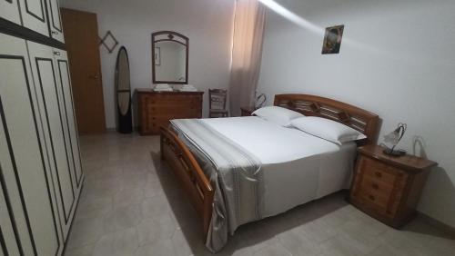 Postel nebo postele na pokoji v ubytování CasaMaPiè Binetto