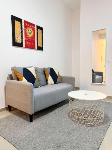 Гостиная зона в 2 bdr cozy apt in Terra Branca, Free Wifi - LCGR