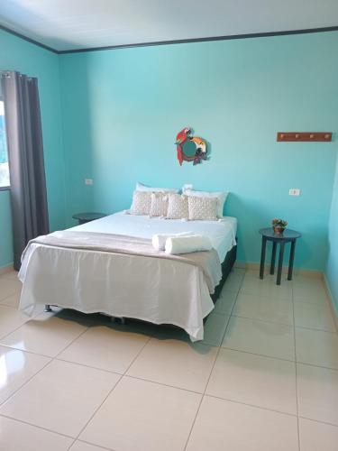 Cama ou camas em um quarto em Pousada Gramachos