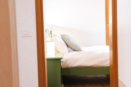 Una cama o camas en una habitación de Agriturismo La Collina delle Api