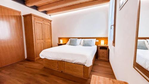 Una cama o camas en una habitación de Agriturismo La Collina delle Api