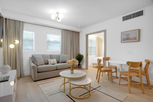 a living room with a couch and a table at Vonder Miami Beach - Unit 6 in Miami Beach
