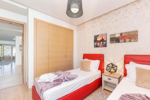 Ένα ή περισσότερα κρεβάτια σε δωμάτιο στο Alma Prestigia Appartments