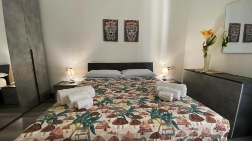 Postel nebo postele na pokoji v ubytování Sicily Casa Vacanze