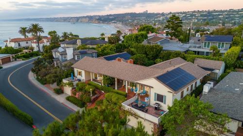 an aerial view of a house with a road at La Jolla Shores Oceanview Retreat in San Diego