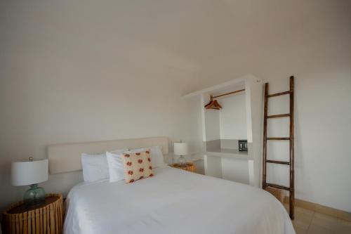 Postel nebo postele na pokoji v ubytování Hotel Amaca Puerto Vallarta - Adults Only