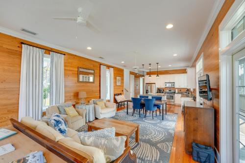 a living room with a couch and a table at Beach and Pool Access Peaceful St Teresa House in Big Blackjack Landing