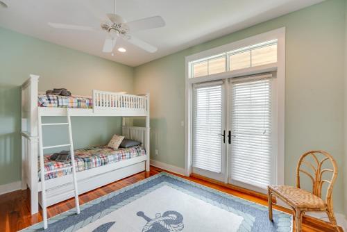 a bedroom with two bunk beds and a window at Beach and Pool Access Peaceful St Teresa House in Big Blackjack Landing