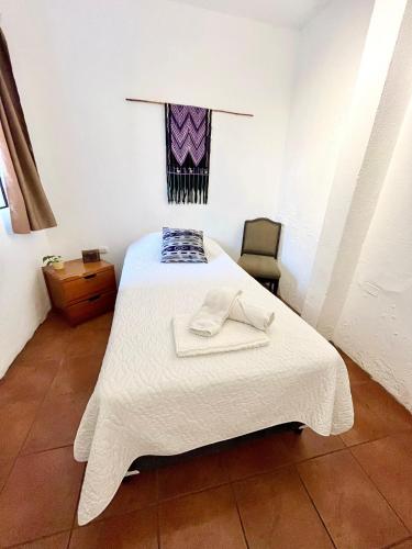 Ένα ή περισσότερα κρεβάτια σε δωμάτιο στο Casa ELA Candelaria