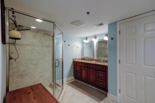a bathroom with a shower and a glass shower stall at Wonderful Luxury Updated Villamare with Pool Bikes & Beach Gear included in Hilton Head Island
