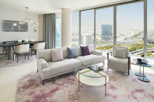 a living room with a couch and a table at InterContinental Residence Suites Dubai Festival City by IHG in Dubai