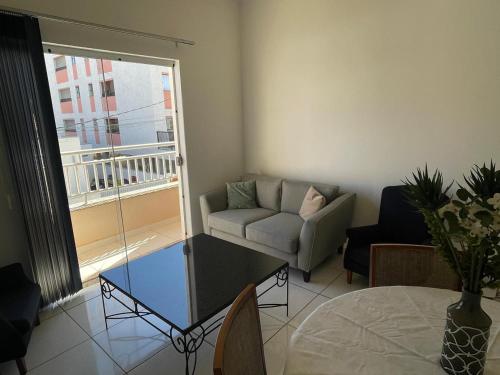 Χώρος καθιστικού στο Apartamento espaçoso de 3 quartos