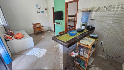 Η κουζίνα ή μικρή κουζίνα στο Vila Axé Flat Lua