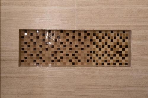 Et badeværelse på Infinity Suites Habitación Triple 211