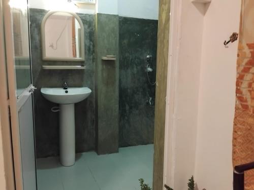 Ein Badezimmer in der Unterkunft Rusara Guest Home