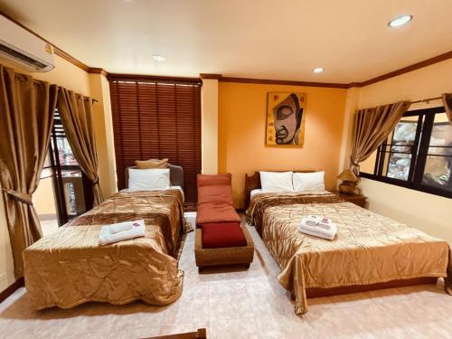 Ένα ή περισσότερα κρεβάτια σε δωμάτιο στο Mini Cost Apartment&Guesthouse