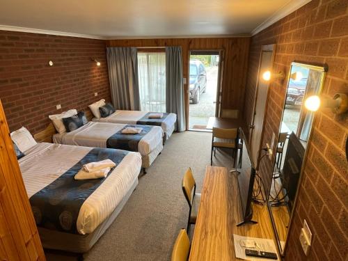 Ένα ή περισσότερα κρεβάτια σε δωμάτιο στο Barham Riverland Motel