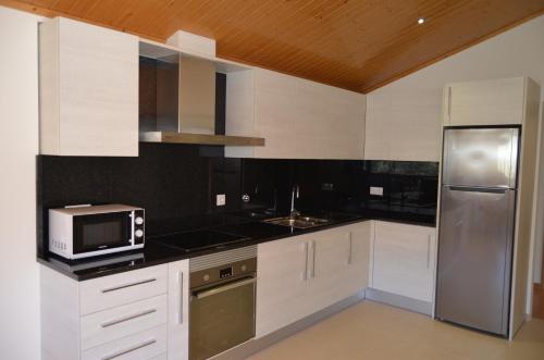 Η κουζίνα ή μικρή κουζίνα στο Casas do Mondego