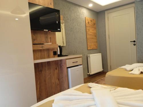 Postel nebo postele na pokoji v ubytování Yellow Bull Istanbul hotel