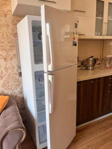 Η κουζίνα ή μικρή κουζίνα στο Halal Comfortable apartament