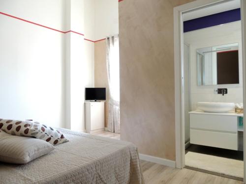 Postel nebo postele na pokoji v ubytování B&B Melanella