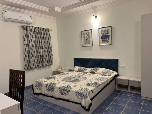 Postel nebo postele na pokoji v ubytování 201 Ishan Apartment - Deluxe