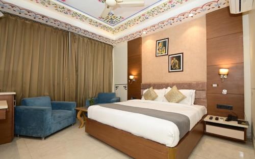 Postel nebo postele na pokoji v ubytování Hotel RR 62-Jaipur City Centre Hotel