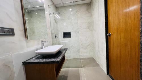 Koupelna v ubytování Hotel Aashraya