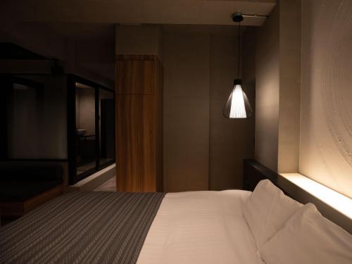 ODO HOTEL オドホテル(大人専用)にあるベッド