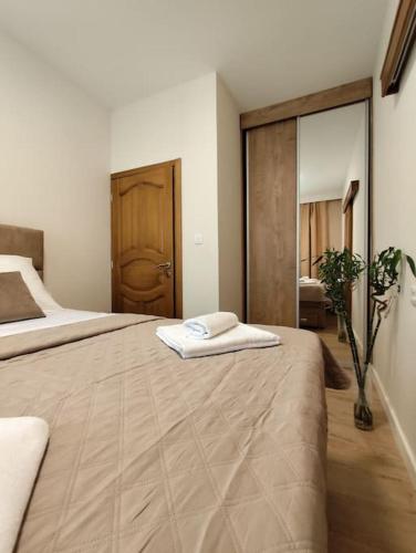 Giường trong phòng chung tại Vidikovac