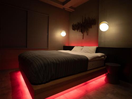 ODO HOTEL オドホテル(大人専用)にあるベッド