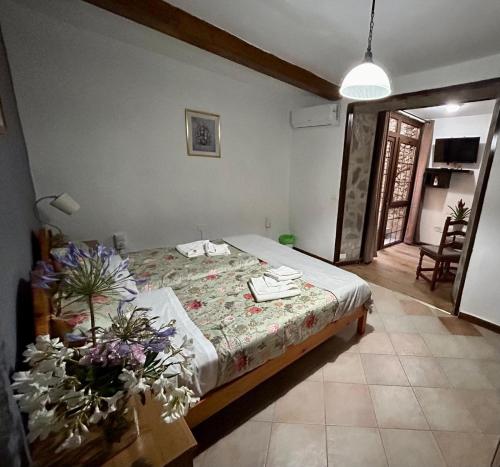 Ένα ή περισσότερα κρεβάτια σε δωμάτιο στο Jardin Las Hayas