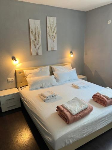 Postel nebo postele na pokoji v ubytování Villa M