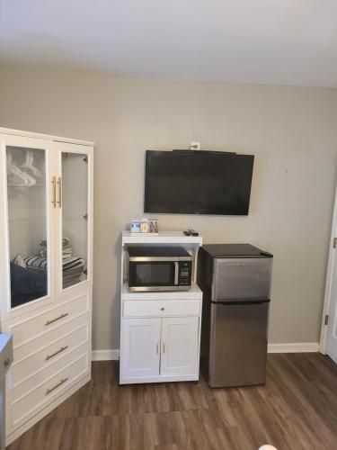 Η κουζίνα ή μικρή κουζίνα στο Staycation Oasis