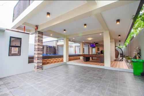 Μια τηλεόραση ή/και κέντρο ψυχαγωγίας στο Casa Florida Private Resort - Calamba