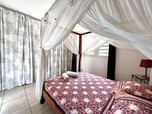 Postel nebo postele na pokoji v ubytování Martinique Villa Escale Diamant