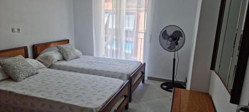 Postel nebo postele na pokoji v ubytování Habitación Doble a 100 m de la Playa