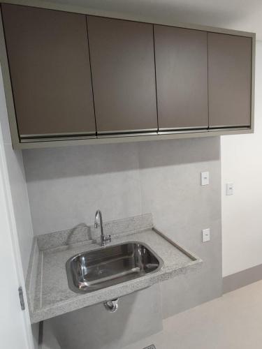Kuchyň nebo kuchyňský kout v ubytování Ap 2 4 com suíte Edifício City House