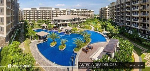 an overhead view of a swimming pool in a resort at Eves Urban Haven in Manila
