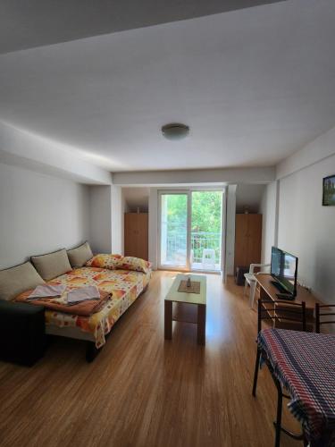 Postel nebo postele na pokoji v ubytování Apartment Joco