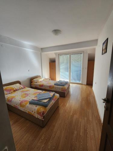Rúm í herbergi á Apartment Joco