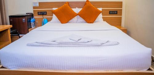 Postel nebo postele na pokoji v ubytování Freedom Resort