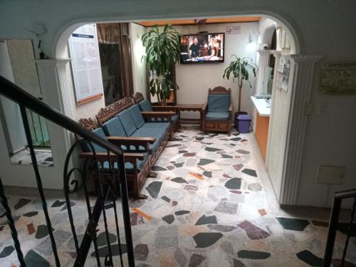 Kuchyň nebo kuchyňský kout v ubytování Hotel Manhattan City