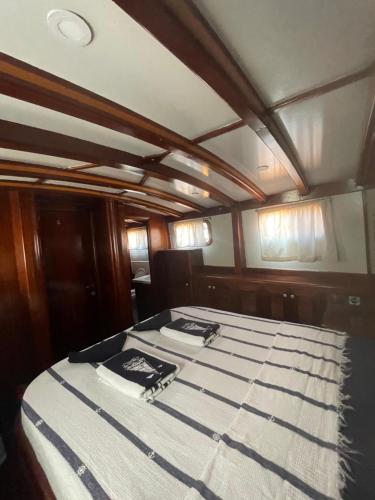 a bed in the back of a boat at Usta-k in Bodrum City