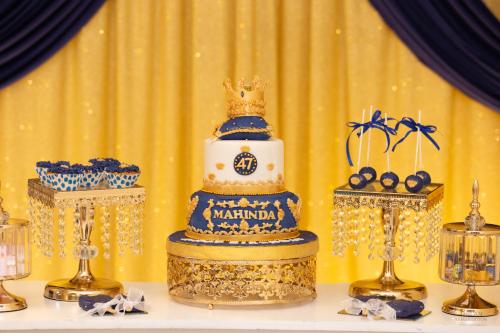 a cake with a crown on top of a table at Heaven Palace in Kandy