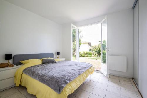 En eller flere senge i et værelse på Kali'Na