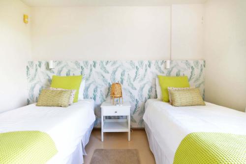 Ένα ή περισσότερα κρεβάτια σε δωμάτιο στο Salobre Los Lagos 8