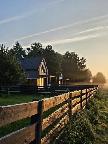 Fotografie z fotogalerie ubytování Osada pod Gwiazdami & SPA - DELUXE blisko jezioro, ogrodzony, ognisko, taras, dodatkowa sypialnia v destinaci Łasko