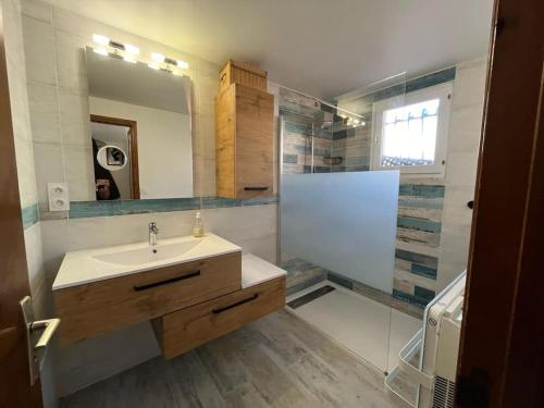 Koupelna v ubytování Maison de charme en bord de mer