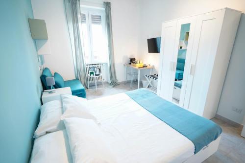 Postel nebo postele na pokoji v ubytování Salotto Tiburtino